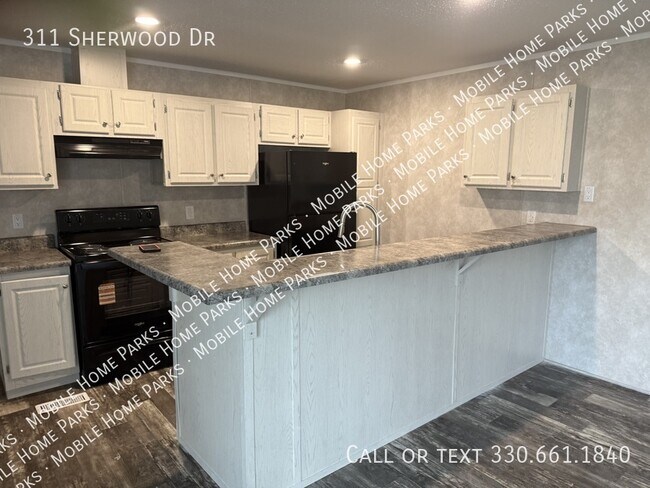 Foto del edificio - 311 Sherwood Dr