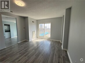 Building Photo - 135 James St S