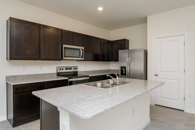 Foto del edificio - 2963 Suncoast Plains Dr