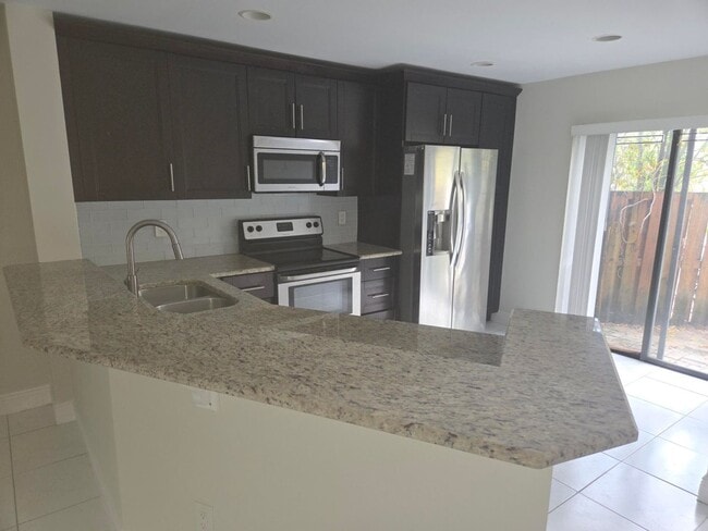 Photo - 7890 Lago Del Mar Dr House