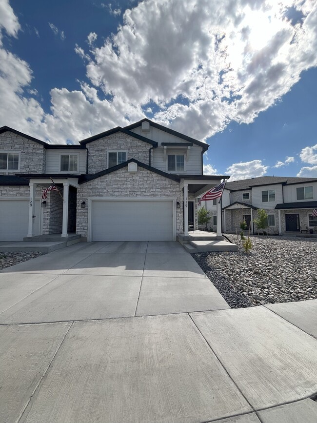 Front View with Two-Car Garage - 525 W Caroles Way