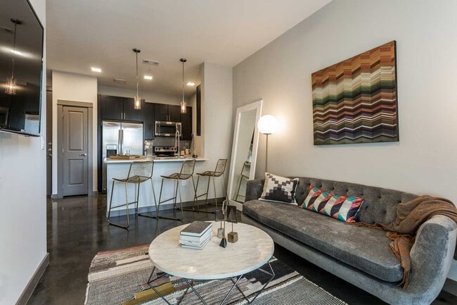 Building Photo - Your Downtown Lifestyle Begins Now