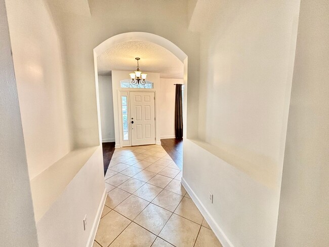 Foto del edificio - 4 Bed, 3 Bath, Corner Lot Home with Lanai, Fireplace, and Plenty of Community Amenities! Waived A...