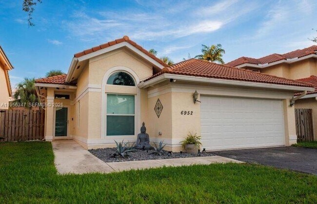 Building Photo - 6952 NW 27th Ct