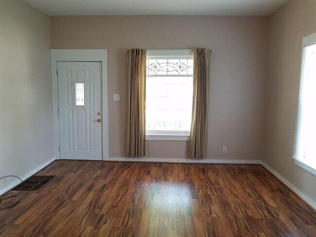 Living Room *Photo of similar unit* - 180 E Scott St