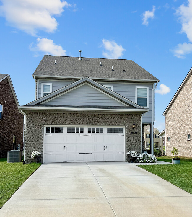 Home Rear - Rear entry garage - 911 Nance Ln