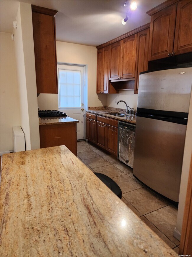 Building Photo - 144-42-144-68 68th Dr