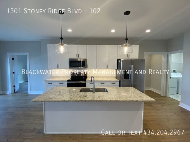 Building Photo - Move In Special! 1/2 Off Your First Full M...