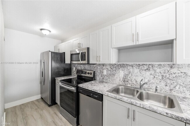 Foto del edificio - 3 br, 2 bath House - 2419 NW 101st St # 2419