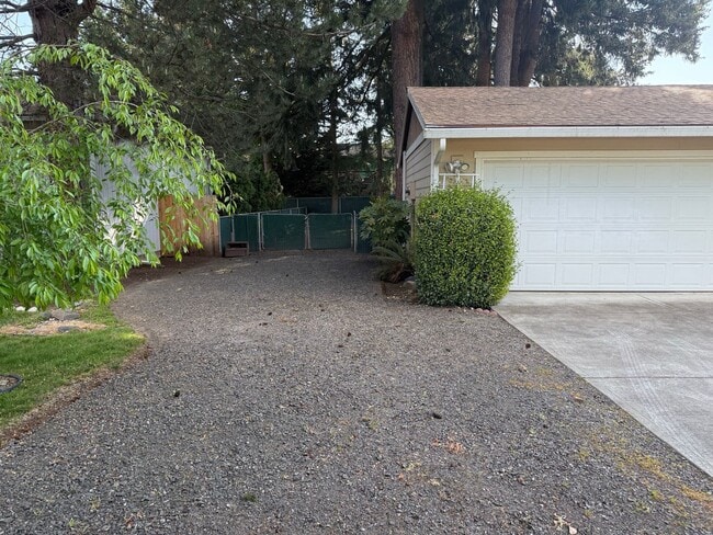 Building Photo - Beautiful 3 Bedroom Ranch Style House with 2 Car Garage, Fences Yard, Fireplace, Shed, Workshop &...
