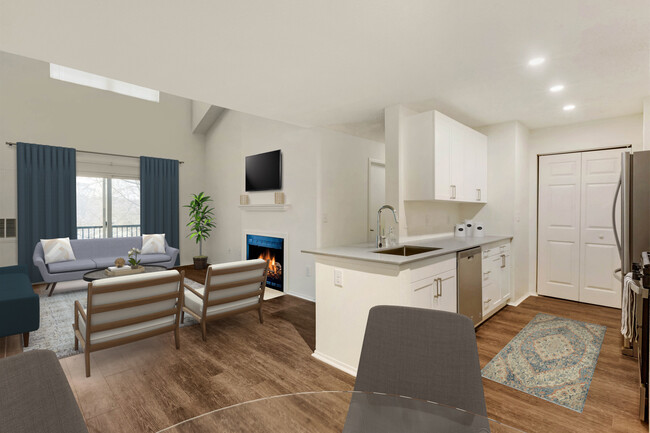 Renovated Package I kitchen, dining, and living areas with hard surface plank flooring - Avalon at Lexington