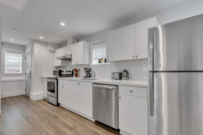 Building Photo - 443 E 55th Ave