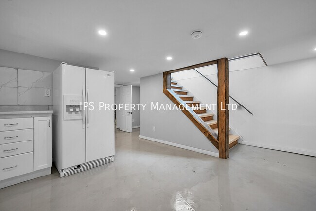 Photo du bâtiment - 2 Bed + Den | 1 Bath All inclusive