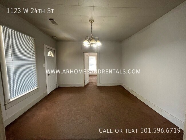 Foto del edificio - 1123 W 24th St | $695 | 3 beds, 1 full bath