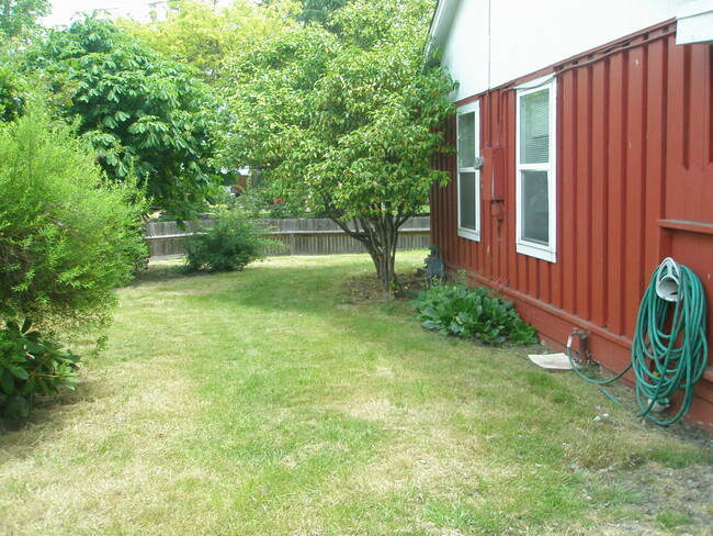 Building Photo - House with garage, carport, yard, & shed