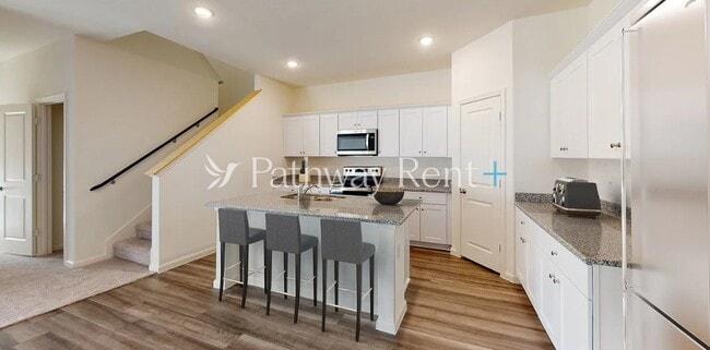 Building Photo - 202 Wild Daisy Wy