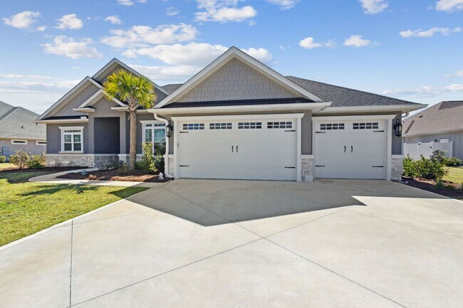 Foto del edificio - Sophisticated 4-Bedroom Home in Gated Fidd...