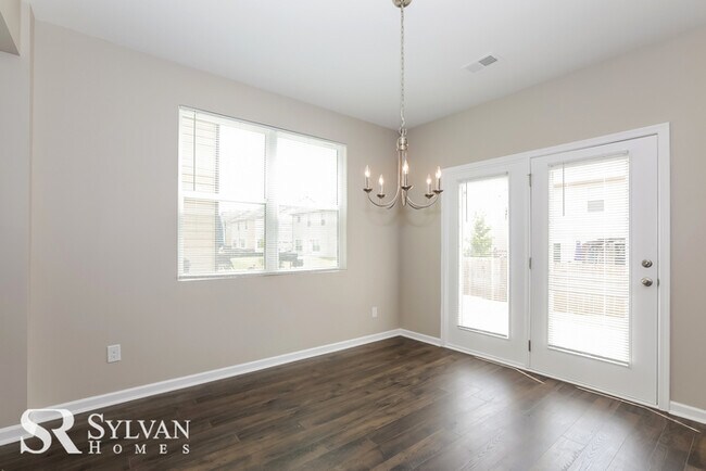 Building Photo - This spacious 4 BR 2.5BA home