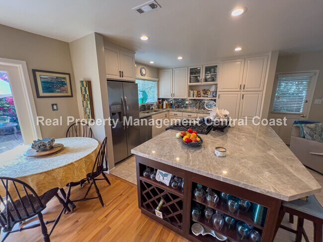 Building Photo - AVAILABLE NOW - Beautiful Furnished Shell ...