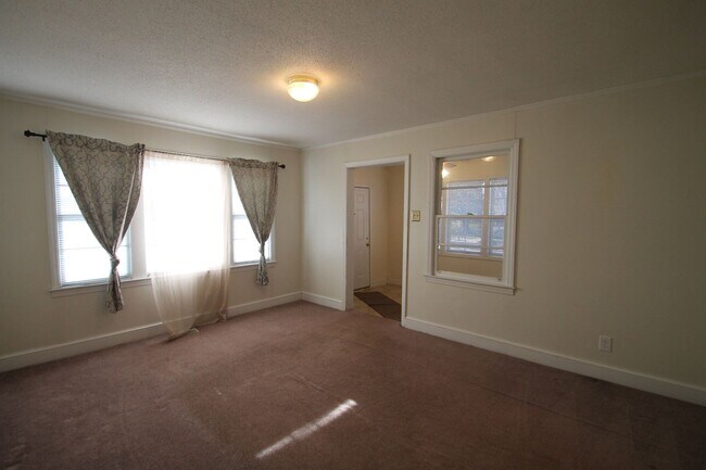 Building Photo - Exclusively Offered by Muse Realty Rentals...