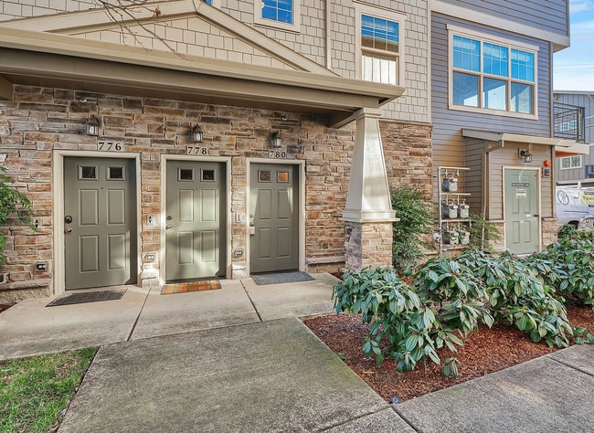 Photo - 2BR + 2.1BA Corner Townhome-Style Condo — Dual Primary Suites, Attached Garage & Most Utilities I...