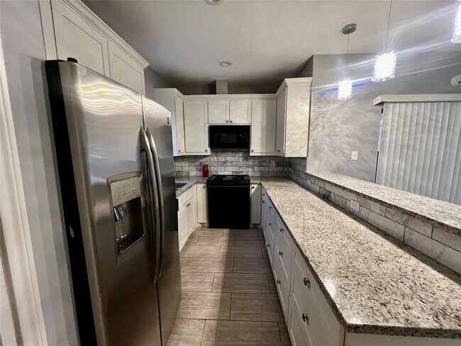 Foto del edificio - 3100 Walnut Bend Ln