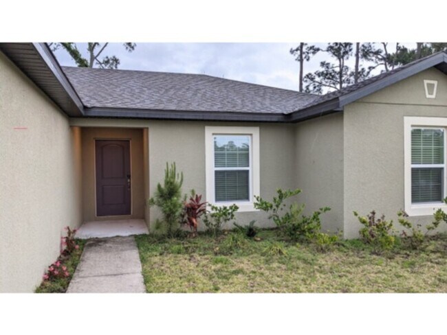 Building Photo - Move In SPECIAL!! Palm Coast House: 3 Bedr...