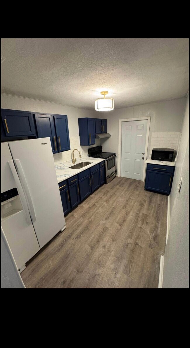 Building Photo - 3719 138th Ave