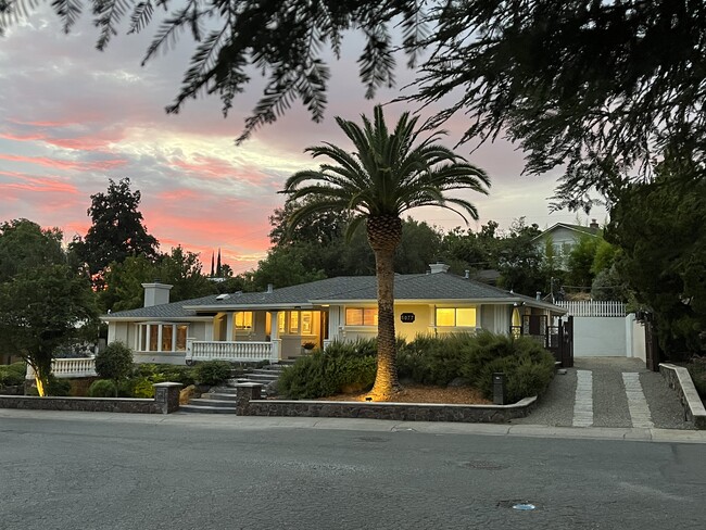 Street view at sunset - 5077 Cocoa Palm Way