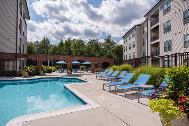 Outdoor Resort-Style Pool, Hot Tub, and Sundeck - The Cosmopolitan at Lorton Station