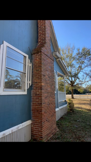 side view - 205 E Brumby Ave