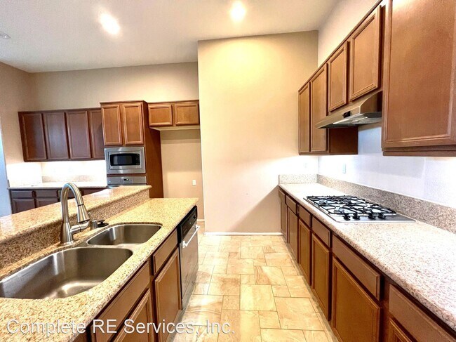 Building Photo - 4 br, 2 bath House - 16352 Freesia Ln