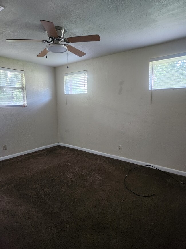 Building Photo - 6945 Woodley Dr