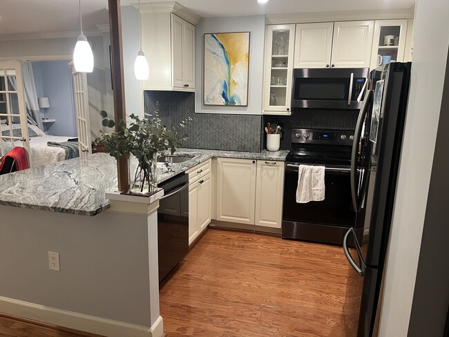 Fully updated kitchen with granite countertops, new appliances - 2440 16th St NW