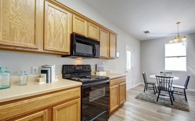 Building Photo - 9114 Magna Carta Loop