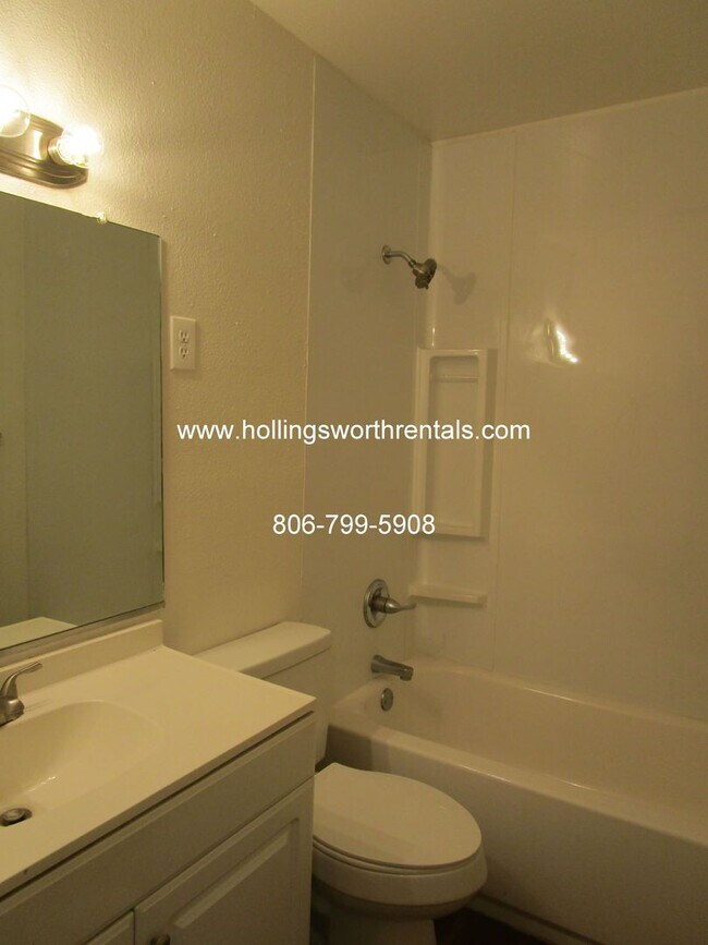 Building Photo - 3 Bedroom, 2 Baths, 2 living rooms with extra large Laundry Room House