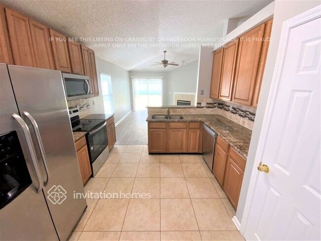 Building Photo - 1623 Canopy Oaks Dr