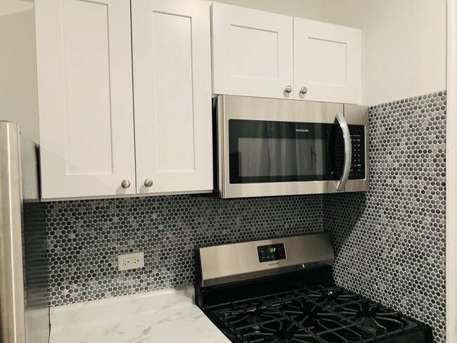 Foto del edificio - 5802 N Mason Ave