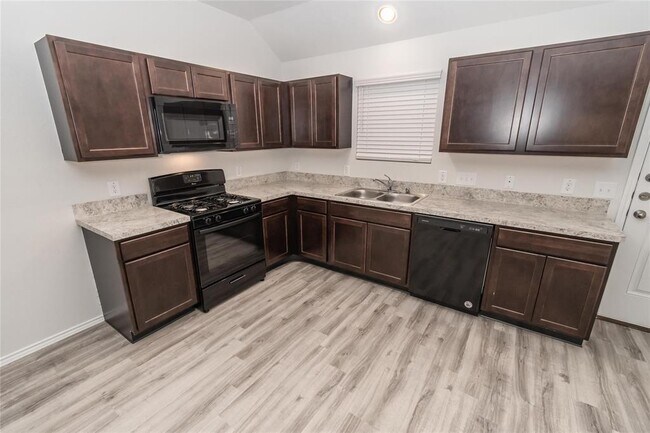 Foto del edificio - 8710 Lar Ree Oaks Cir