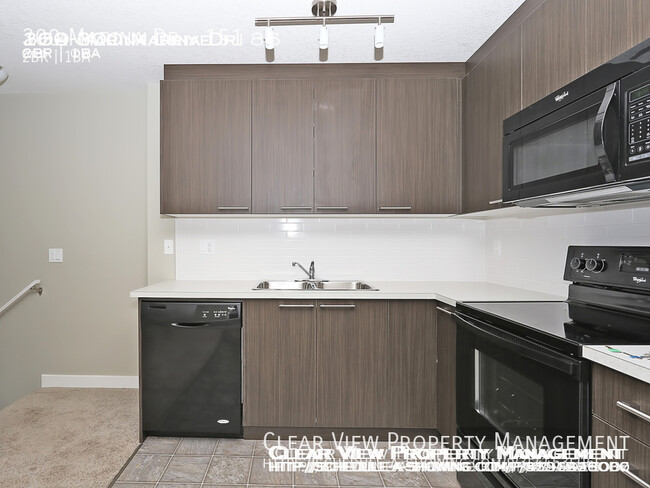 Photo du bâtiment - Chestermere Station 2 bedroom condo! ** Fi...