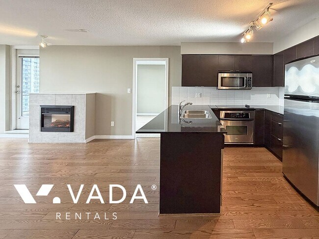 Photo du bâtiment - Tandem 2 BR APT Rental 1706-4182 Dawson St Burnaby: VADA