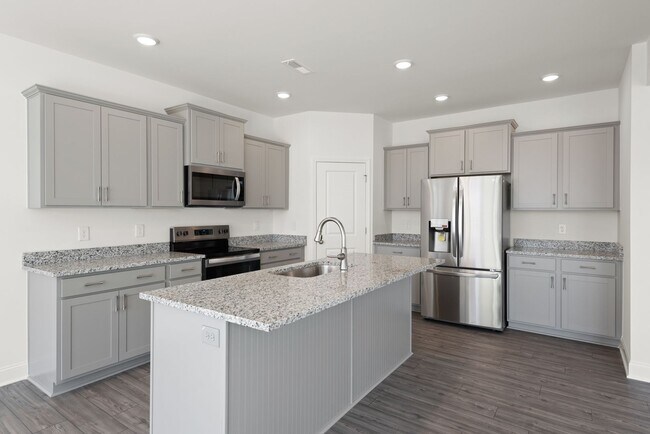 Building Photo - AVAILABLE NOW! Pet-Friendly New Constructi...