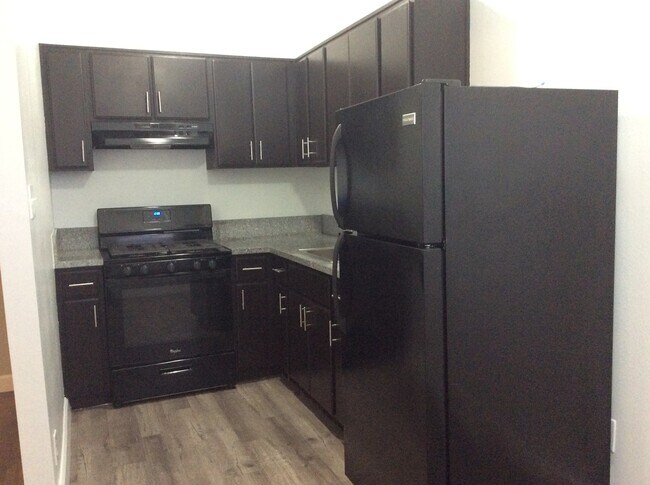Separate kitchen with granite countertops - 2222 Cambridge St