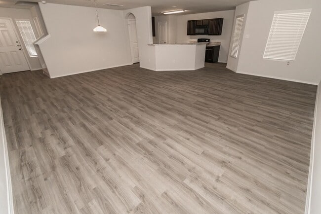 Building Photo - Lone Trail Village - 9214 Yellow Rose Driv...