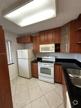 Building Photo - 8740 N Sherman Cir