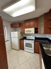Building Photo - 8740 N Sherman Cir