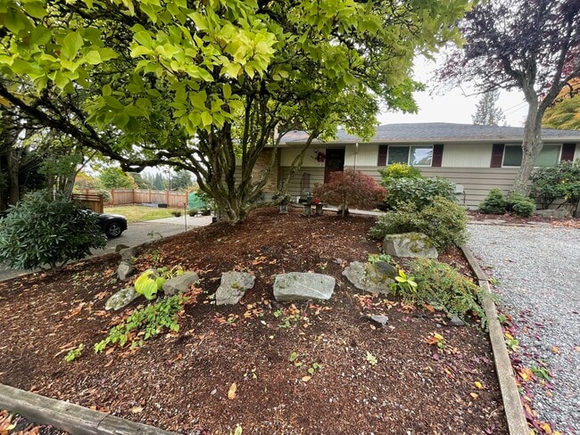 House with upper and lower unit's separate driveways and entrances - 803 N 122nd St,