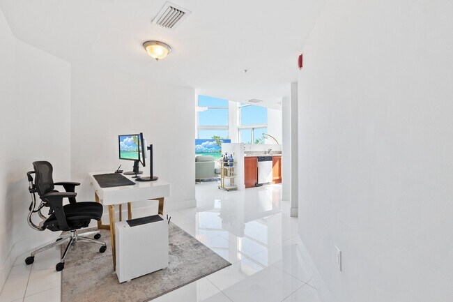 Building Photo - 7728 Collins Ave