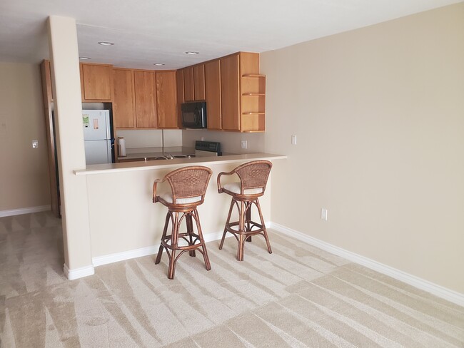 Bar stools included at at kitchen with counter seating - 6780 Friars Rd