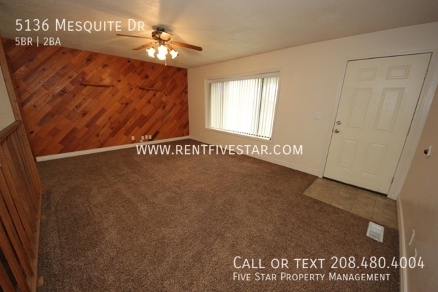 Building Photo - Spacious 5 Bedroom Home with Fenced Yard! ...